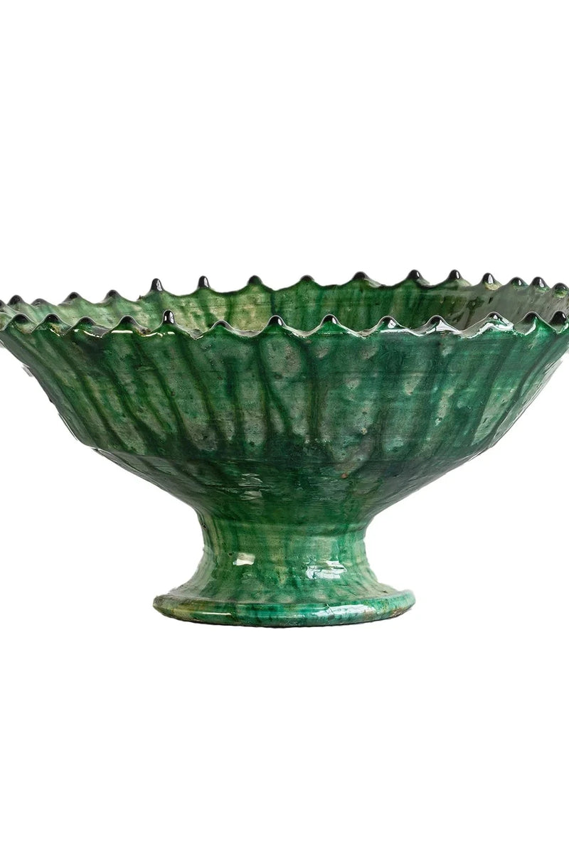 Medium sized green tamegroute compote shown from the side against white. 