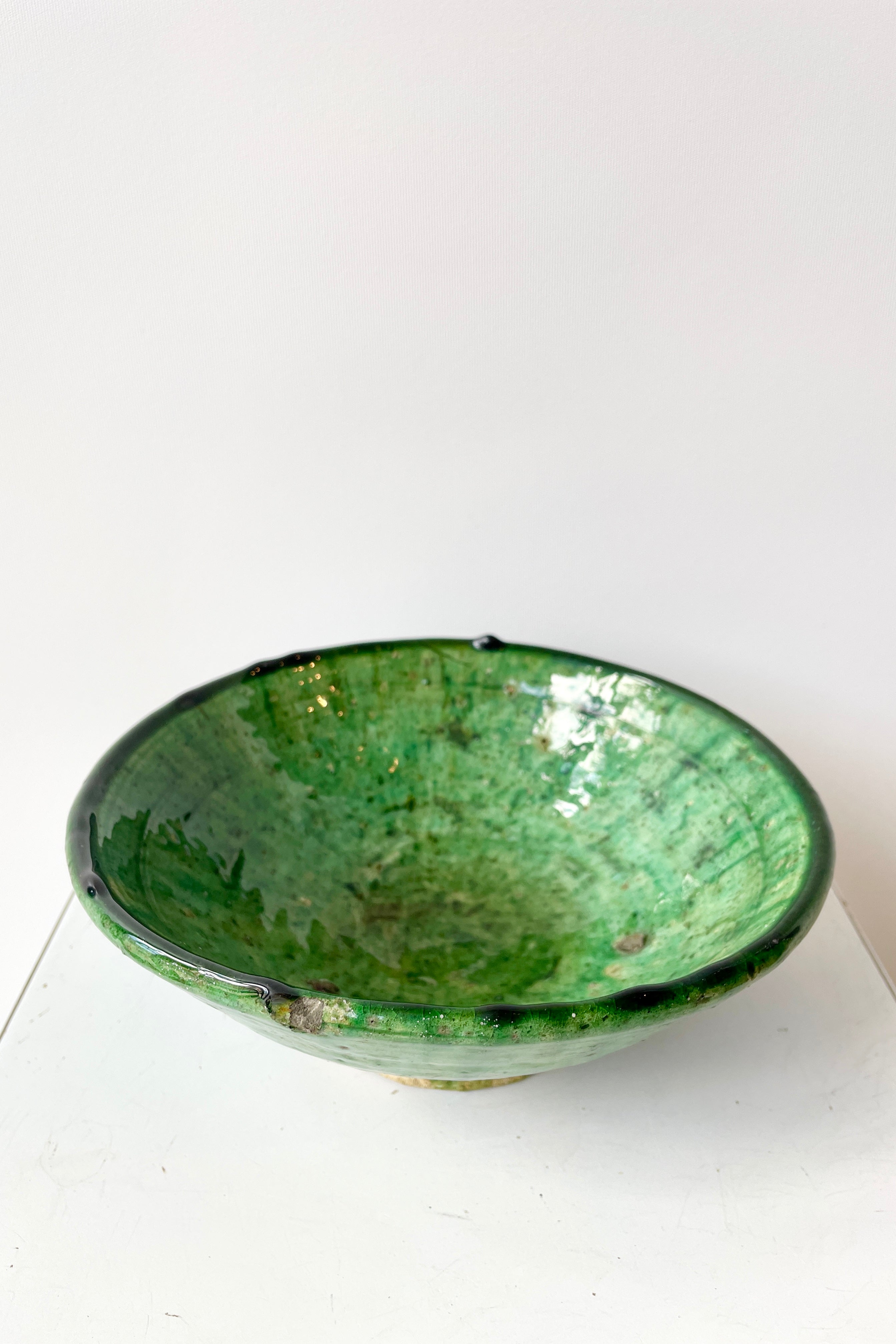 Tamegroute green bowl in small looking from topside in.