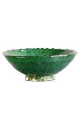 a green Tamegroute bowl shown from the side and on a white background.