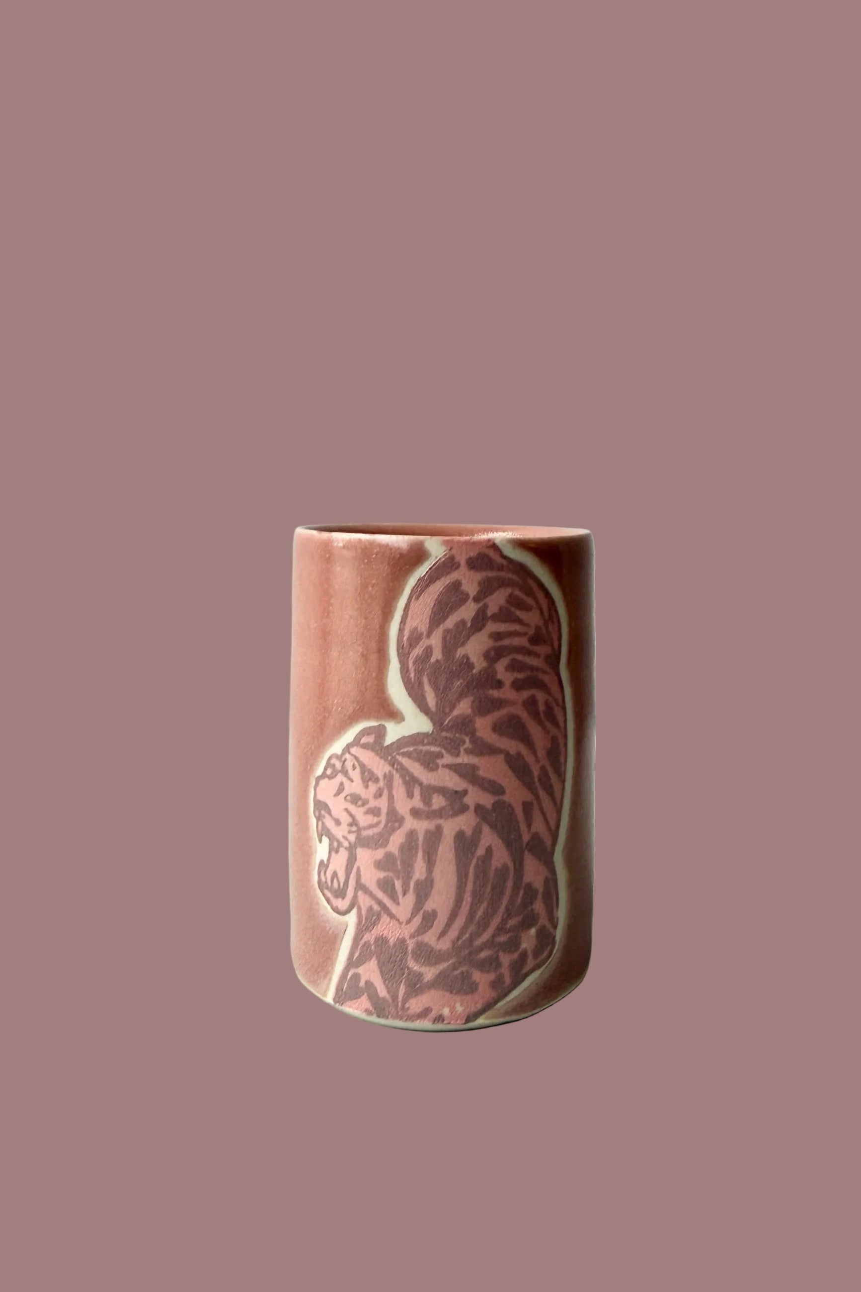 Ceramic tiger mauve shot glass handmade by City in Bloom Ceramics with a pattern on a white surface and background ©Sprout Home
