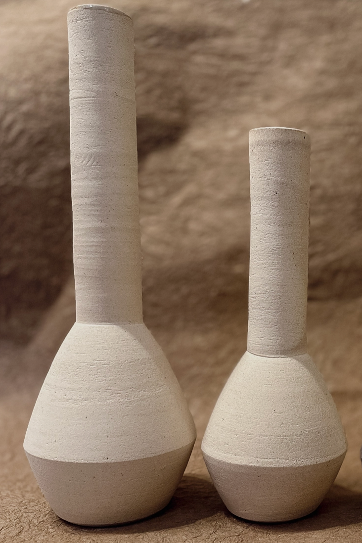Tall ceramic bud vases on a neutral background ©Olivia Snow Ceramics