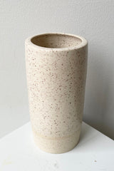 Jacqueline Vase in Cream Speckle small shown from above a side. 