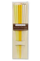 The set of three Yellow gradient acrylic chopstick and their packaging. 