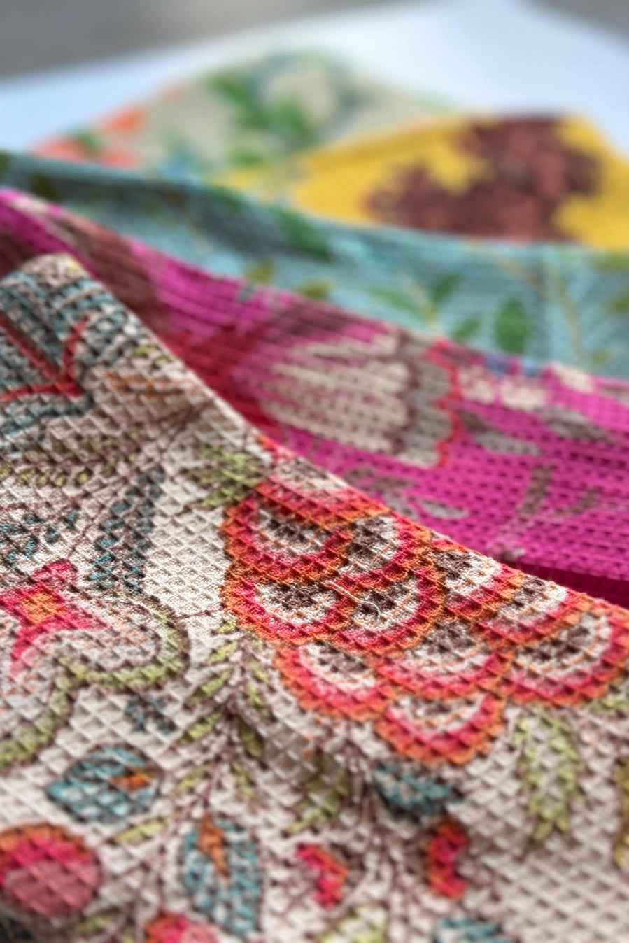 close up of Vintage Print Inspired Kitchen Towel stacked in different prints ©Annahmol