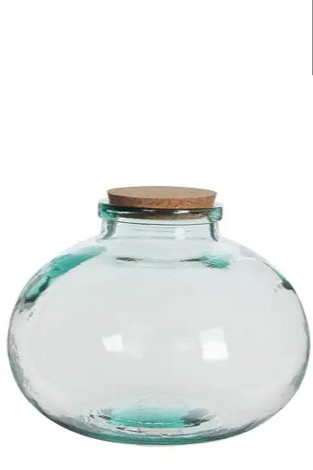 Olly Terrarium 11" x 9" Clear glass jar with a cork lid on a white background, featuring the Mica brand logo. ©Creation Jute USA