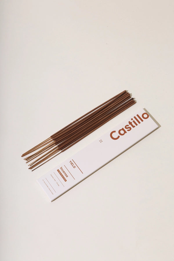 Castillo Stick Incense by Yield stick out of it's packaging and sitting next to