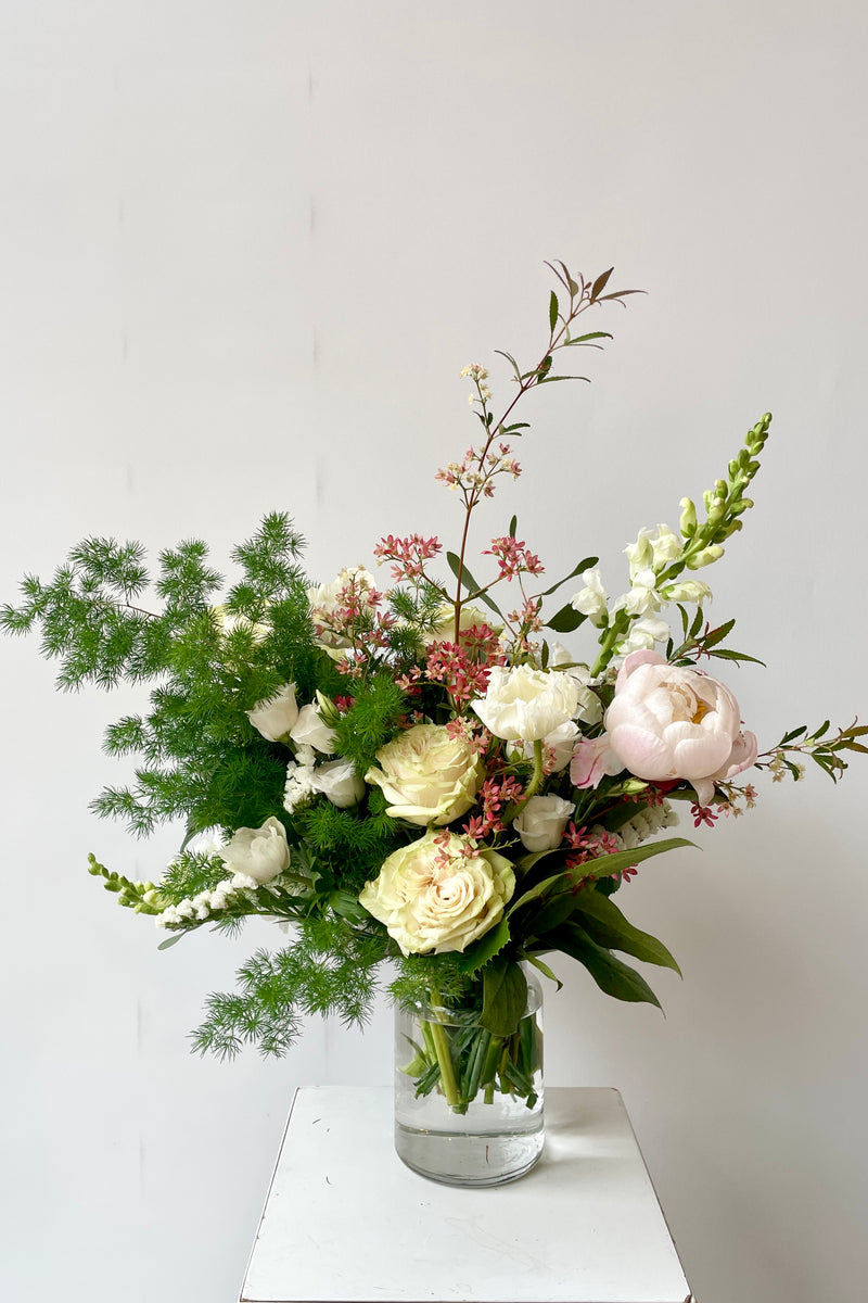 A bleached arrangement with some pink tones in June at Sprout Home