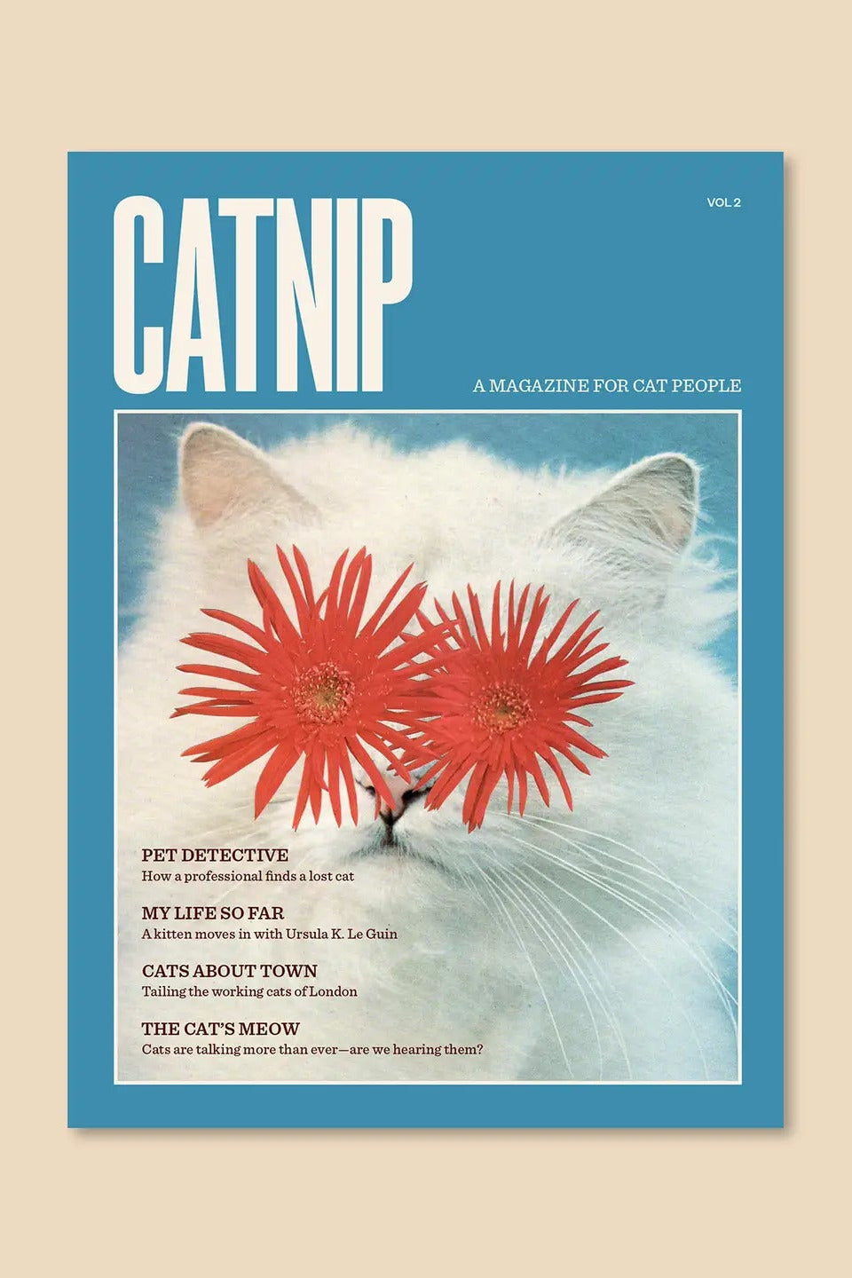 Magazine cover titled 'Catnip' with a cat and flowers on a blue background ©Broccoli