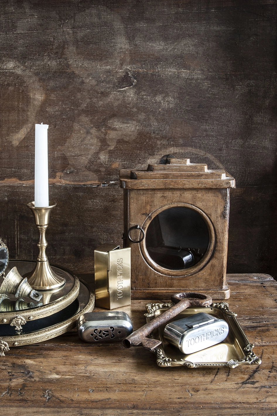 A collection of metal objects on a wooden surface ©Blue Ocean Traders