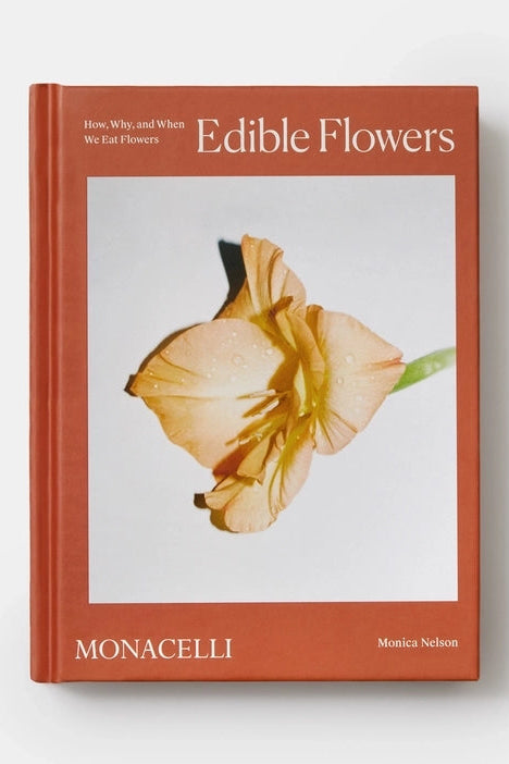 Book titled 'Edible Flowers' with a flower image on the cover against a white background ©Phaidon