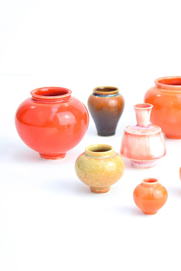 Collection of various ceramic vases on a white background ©SGW Labs
