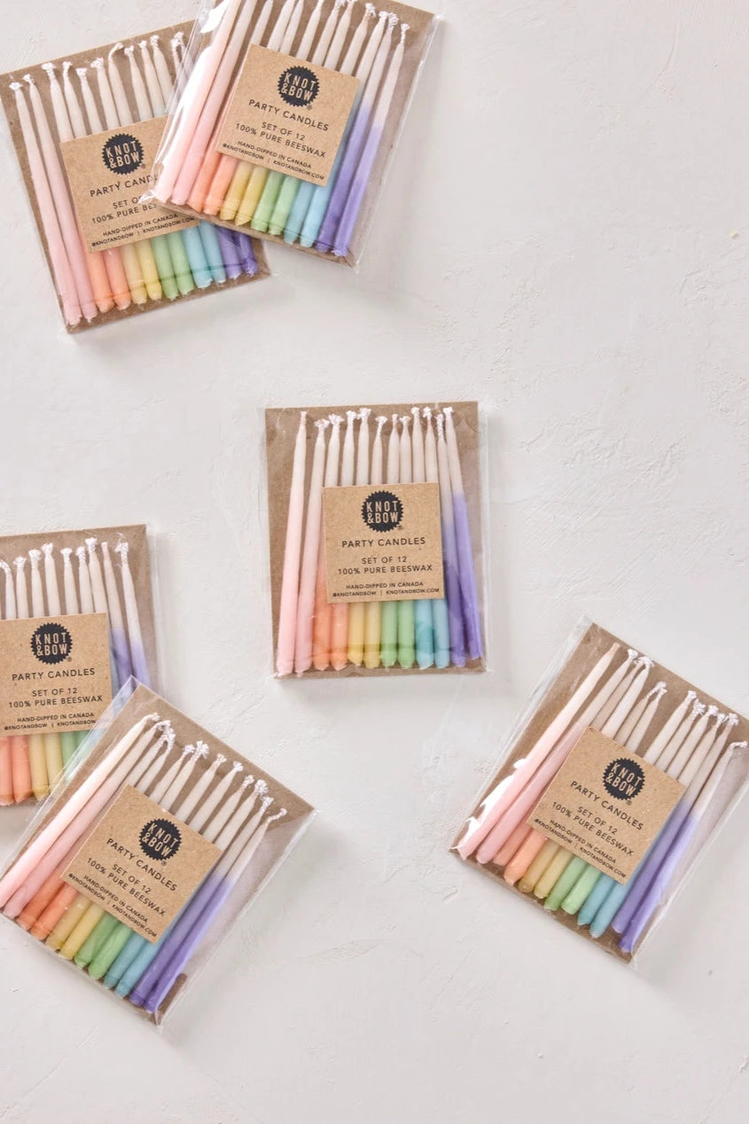 Knot & Bow rainbow ombre short beeswax candles multiple packs laying flat