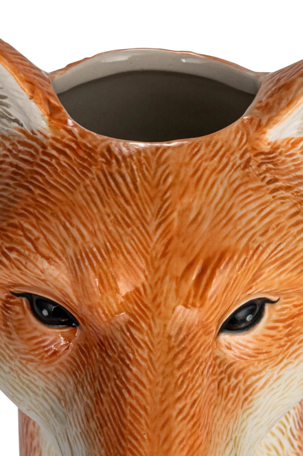 The opening on the top of the Fox Vase up close.