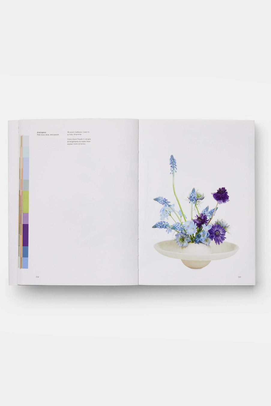 Open Flower Color Theory  book showing a page with a floral arrangement and color swatches on a white background ©Phaidon