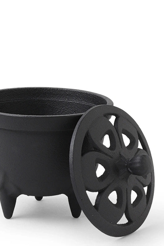Black decorative incense holder pot with a unique design on a white background  ©Miya Company