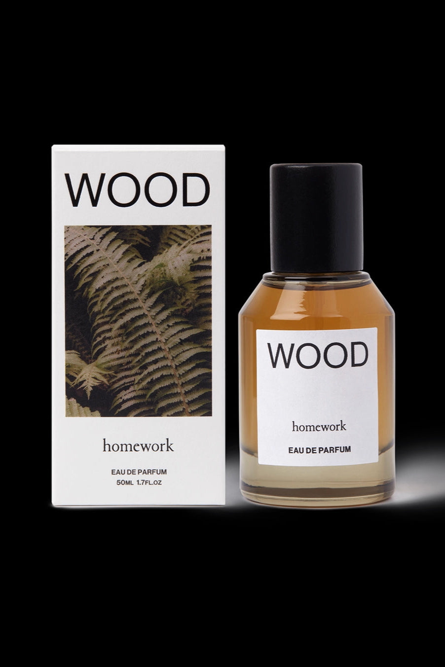 Wood Eau de Parfum Bottle and packaging of 'Wood' perfume by Homework on a black background