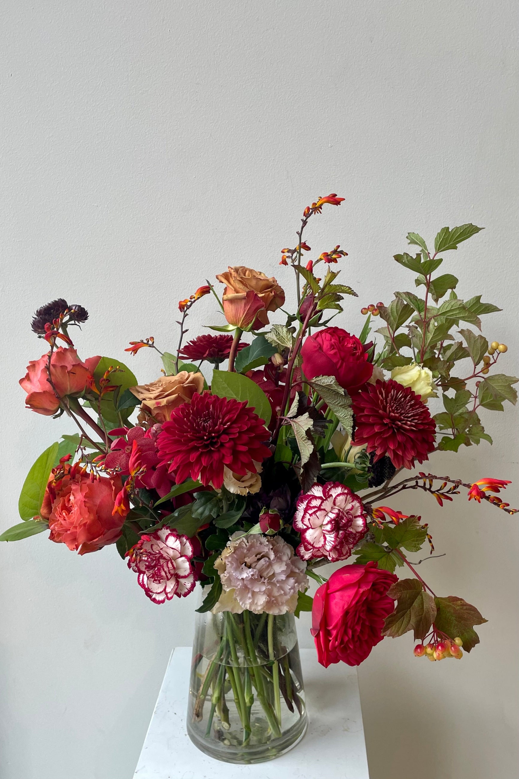 August Earth arrangement with dahlia and roses by Sprout Home. ©Sprout Home  #size_$160