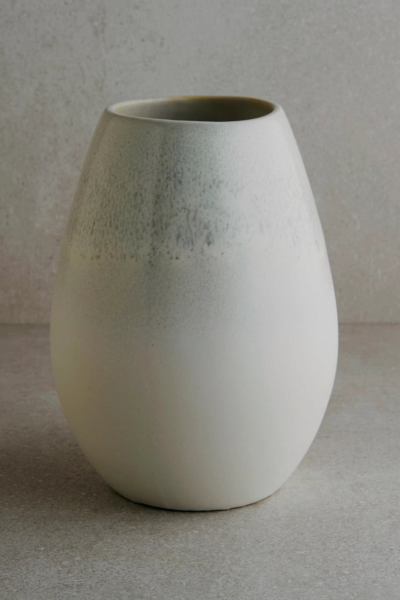 Ceramic Drop Vase against a gray background ©Goodioes