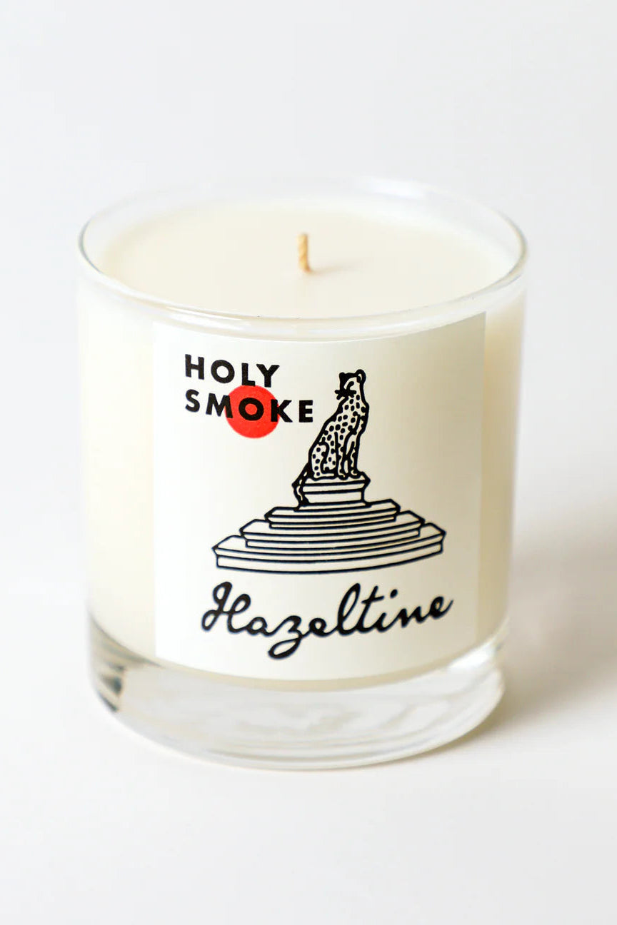 Holy Smoke candle with a graphic of a tiger on a pedestal ©Hazeltine