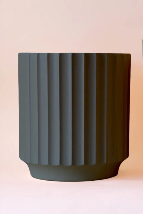 Black Monroe Planters  on a light pink background ©Jungle Club