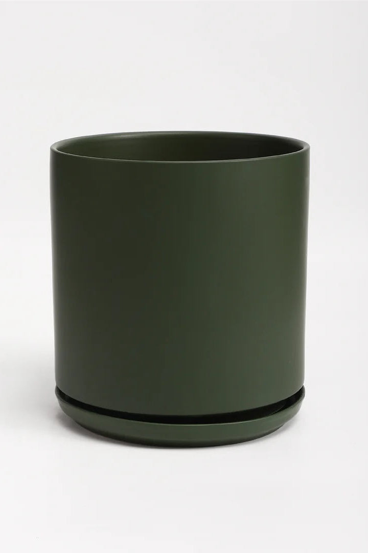 A green planter and saucer on a white background ©LBE Design