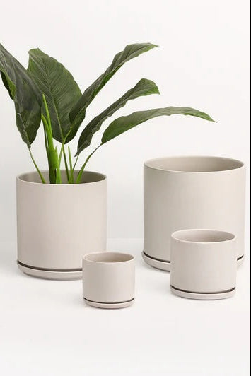 A white planter and saucer set offour on a white background ©LBE Design