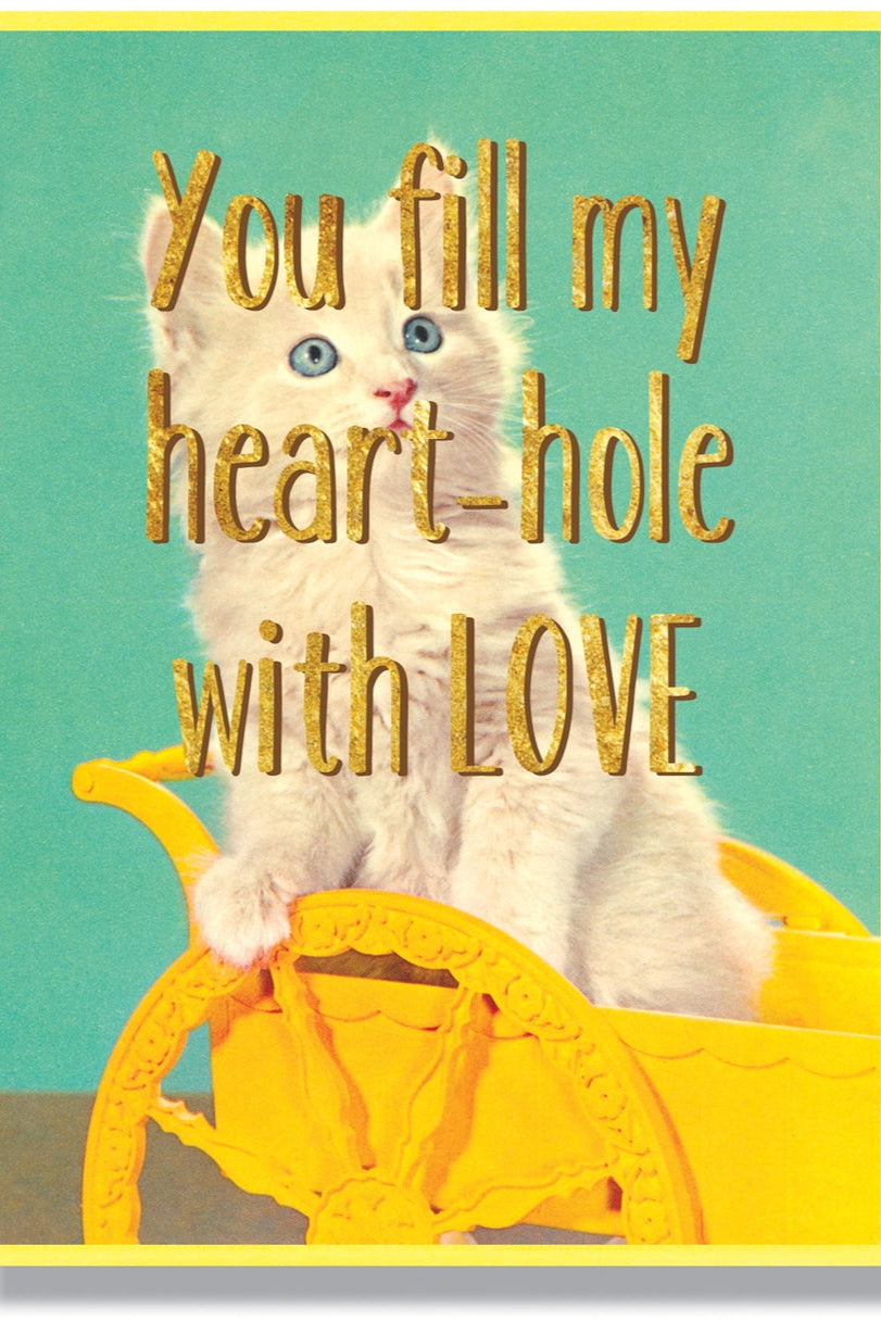 Cat in a yellow wagon with text 'You fill my heart-hole with LOVE' on a teal background You Fill My Heart Hole with Love Card ©Smitten Kitten