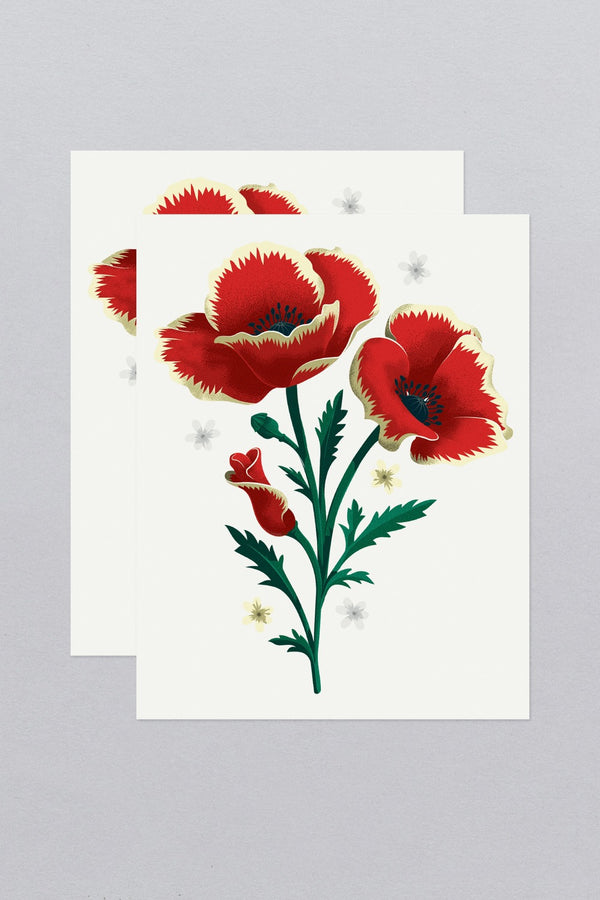 Poppies Tattoo's sheets by Tattly, one sheet on top of another.