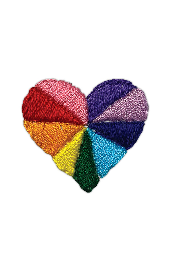 A close up of a Tattly Rainbow Heart Temporary tattoo where you can see the individual 'stitches'