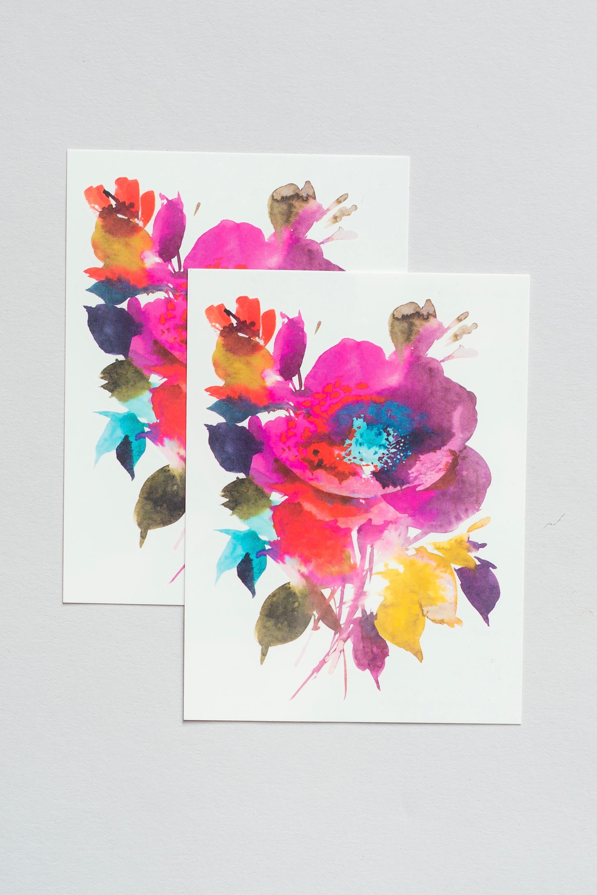 Festive Floral Tattly Tattoo pair one on top of another. 