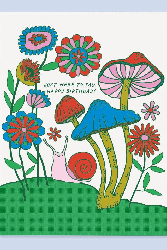The Good Twins Snail Birthday Card with the graphically illustrated snail, mushrooms and flowers. 
