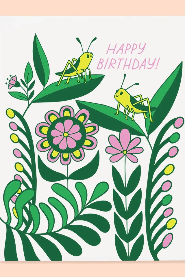 The Good Twins' Happy Birthday Grasshopper card showing the front illustrated floral and two grasshoppers.