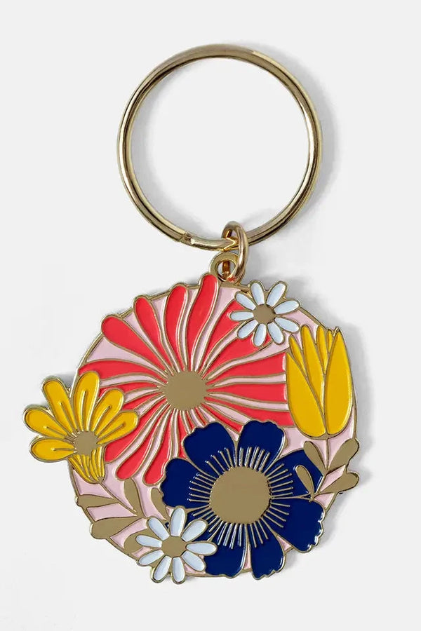 The Good Twins' Cottage Floral keychain shown from the front with its colorful graphics.