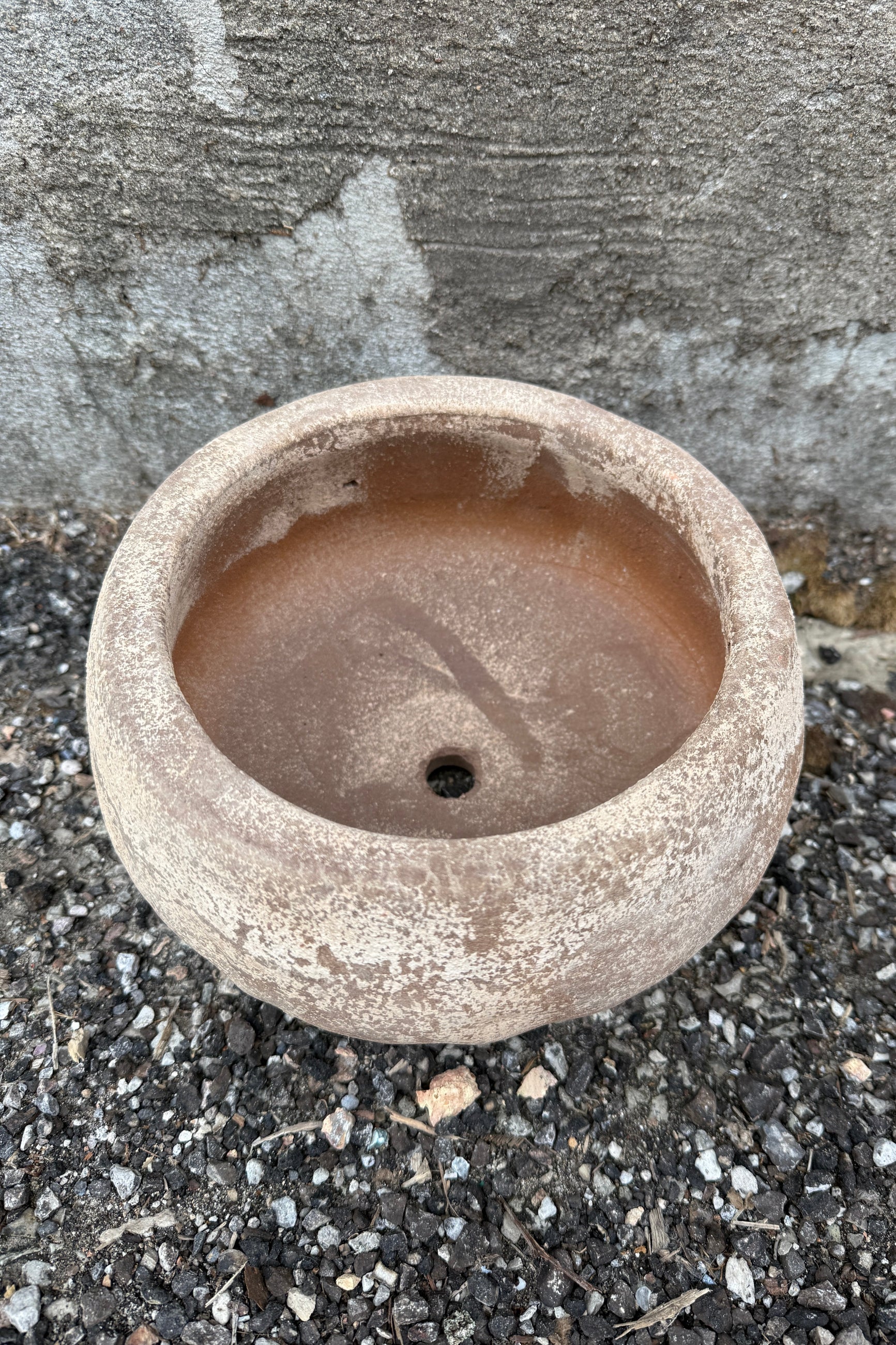 Small Sansui Tapered Vietnamese Rustic small bowl on a textured surface ©Sprout Home