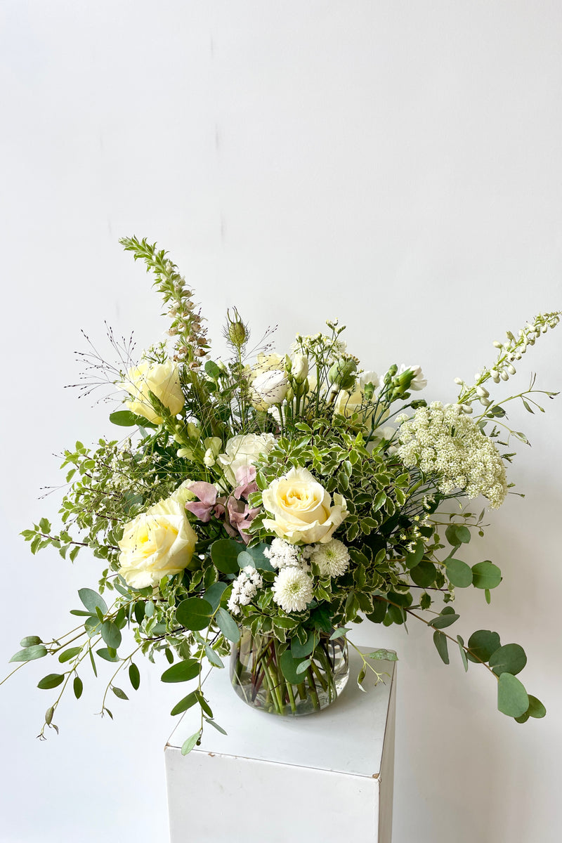 Custom floral white Bleached arrangement by Sprout Home. 