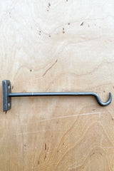 Bijou natural 6" wall hook sitting on birch plywood at Sprout Home.