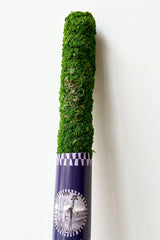 details of Moss Pole green 36" against a white wall