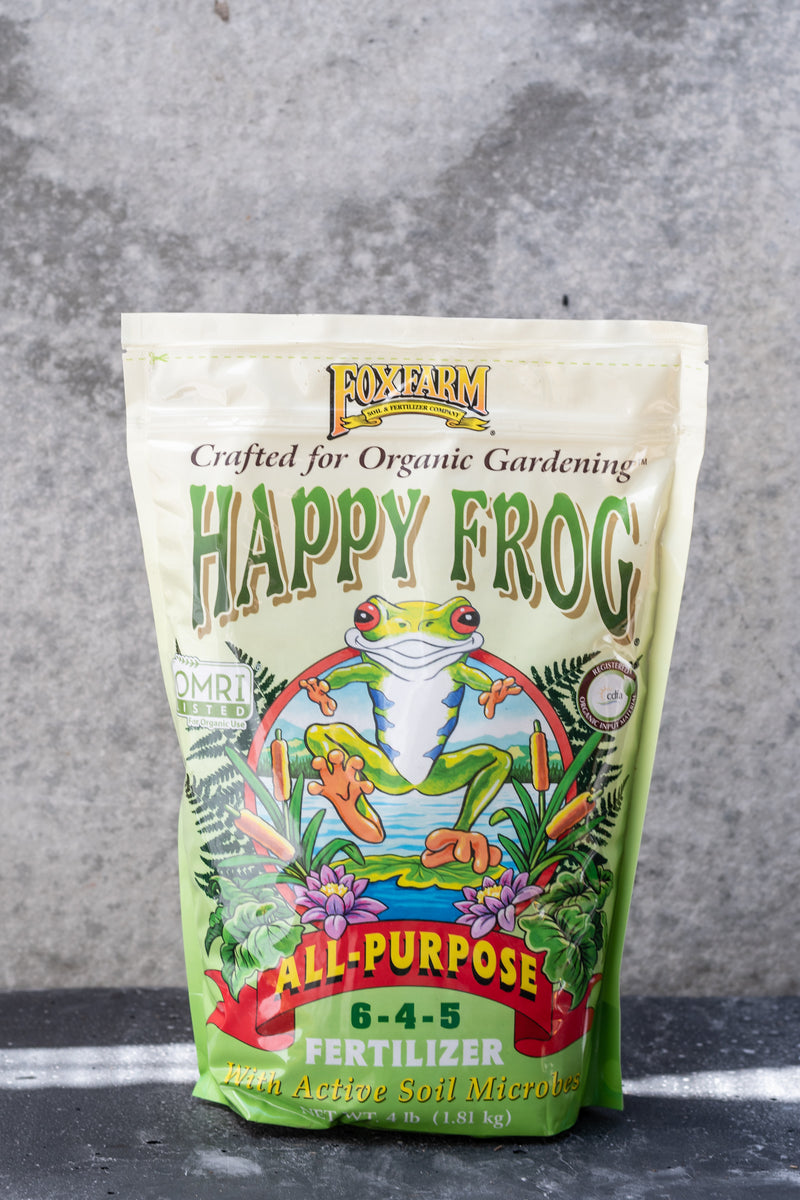 Happy Fog All purpose fertilizer by Fox Farm in its bag with a frog image on it. 