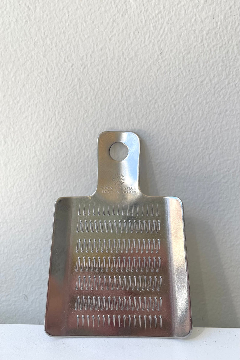 A view of the Wasabi Grater against a white backdrop