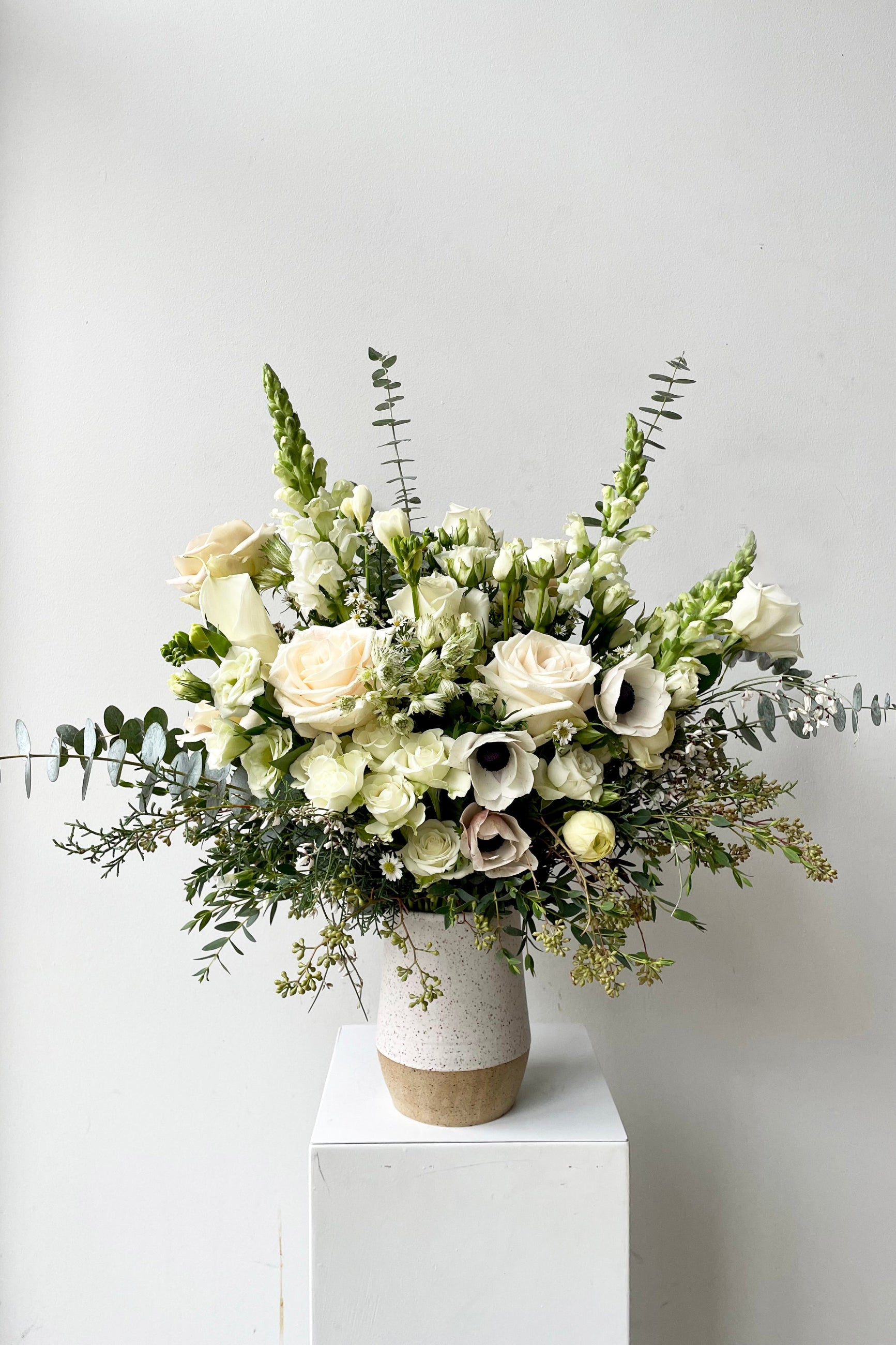 An example of fresh Floral Arrangement Bleached with panda anemone by Sprout Home Floral in Chicago ©Sprout Home  #size_$200