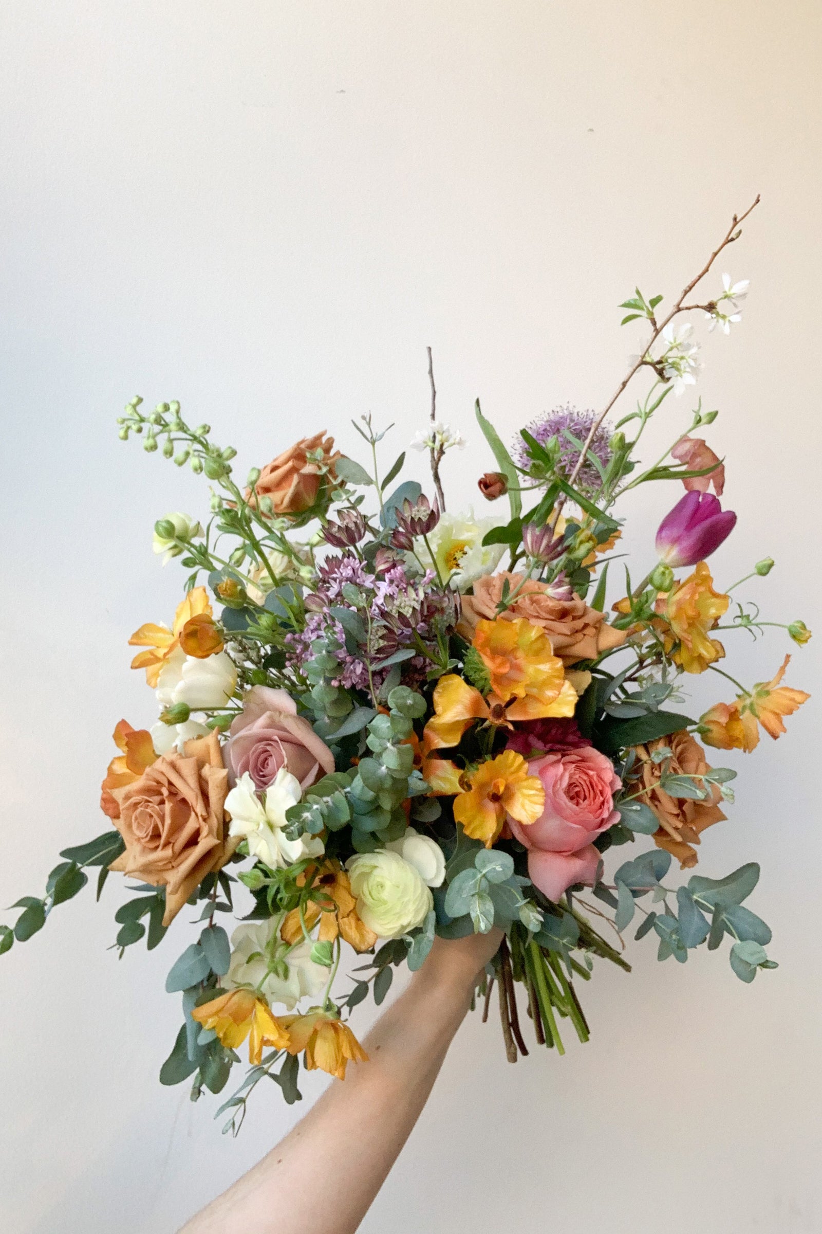 A detailed view of an example of Floral Arrangement Dusk with yellow butterfly ranunculus from Sprout Home in Chicago ©Sprout Home #size_$130