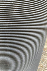 A detail pictures of the horizontal banding on a caviar black Madison pot. 