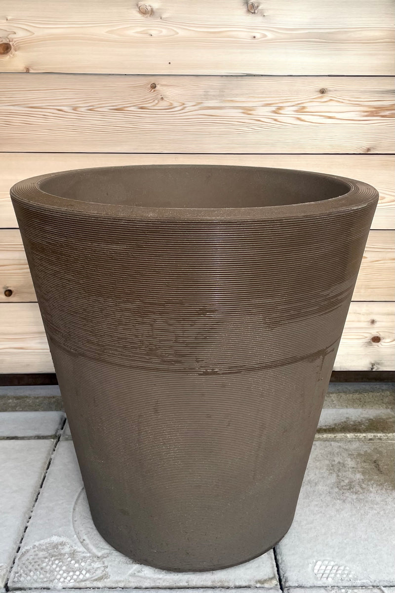 A full view of Madison Mocha Planter 26" against wood backdrop