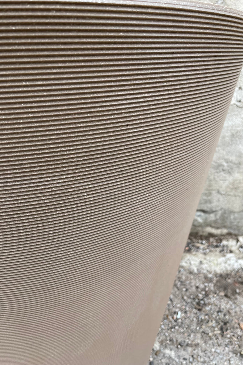 detail picture of the horizontal ridges of the the mocha colored Madison pot. 