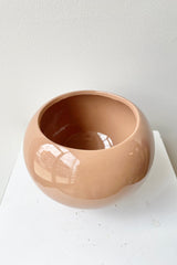 The 5" glossy nude round pot showing the inside of the vessel. 