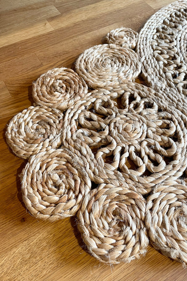 detail of Willow Weave Table Runner against a wood table 