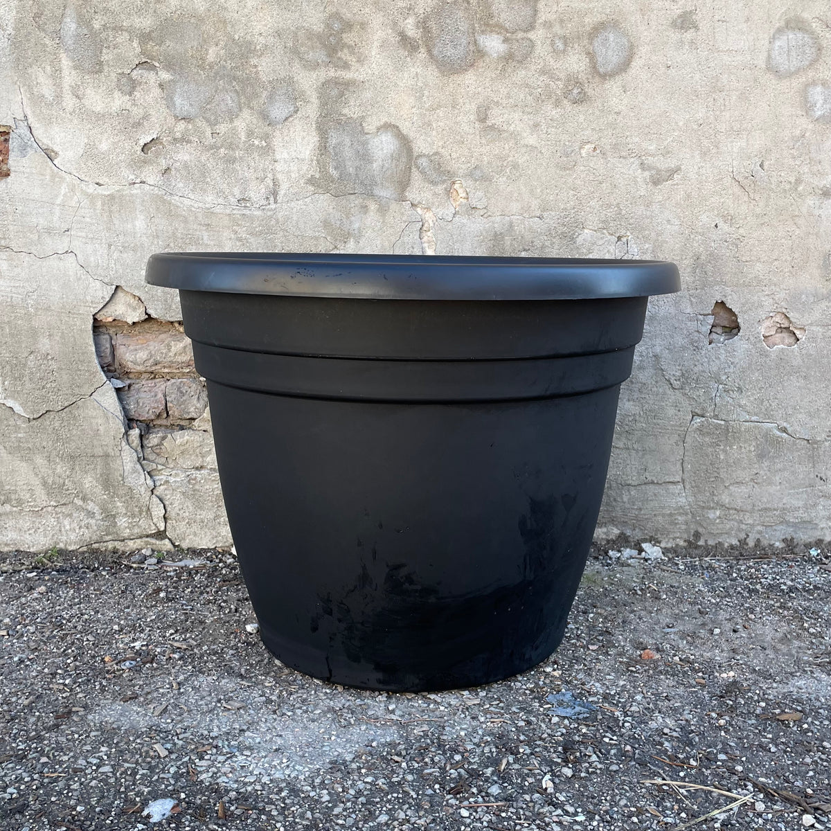 large black plastic plant pots Emma Round Planter Black 25"