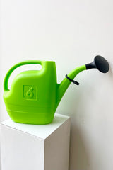 Energy Watering Can Green XL against a white wall