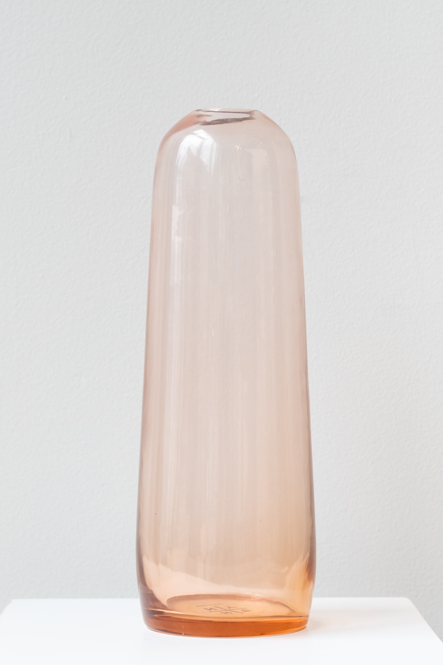 Hawkins New York small blush Aurora pill vase in front of white background