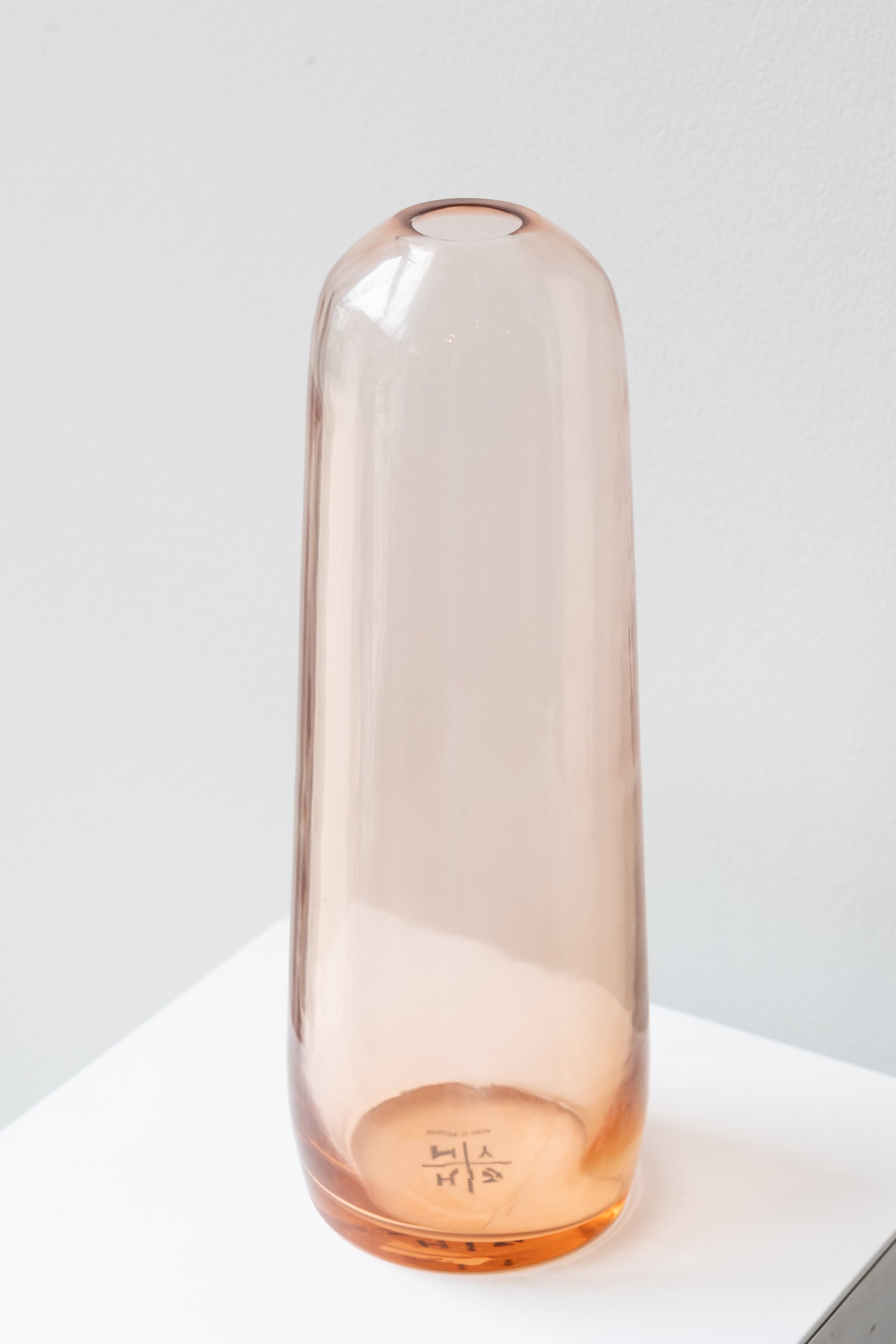Hawkins New York small blush Aurora pill vase in front of white background